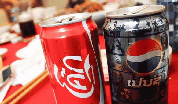 可口可乐Q4业绩全面超预期：可比EPS达0.55美元，营收115亿美元，股价盘前上涨超2%